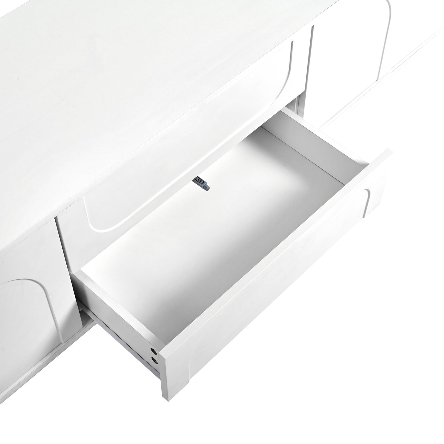 White modern dresser with one open drawer showing smooth gliding hardware