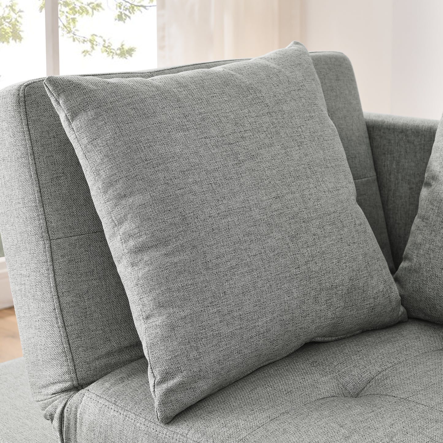 Textured gray throw pillow with plush filling perfect for living room comfort