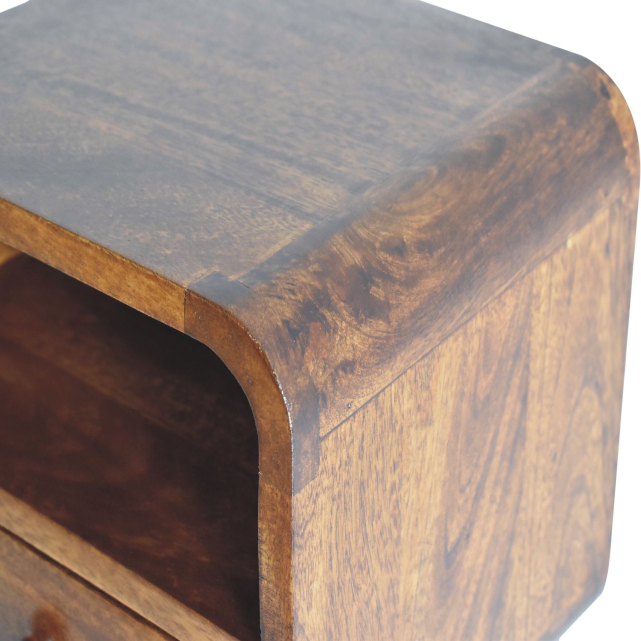 Curved dark wood bedside table with open shelf and drawer detail