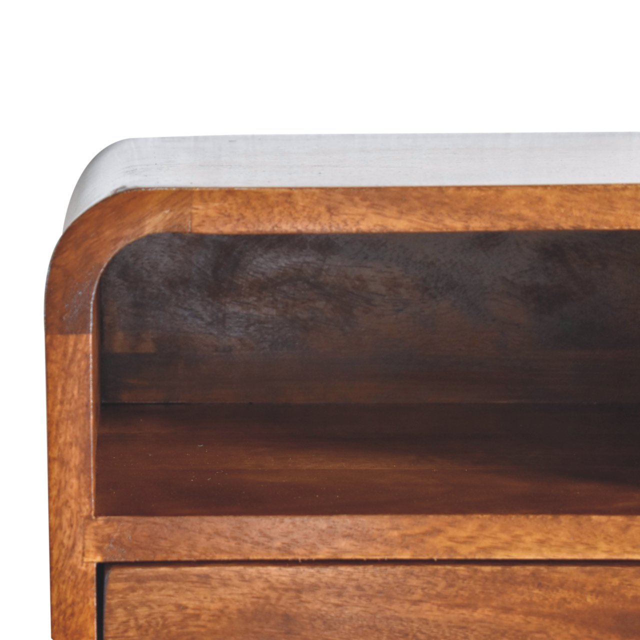 Curved corner of a light gray wooden bedside table with rich brown wood accents
