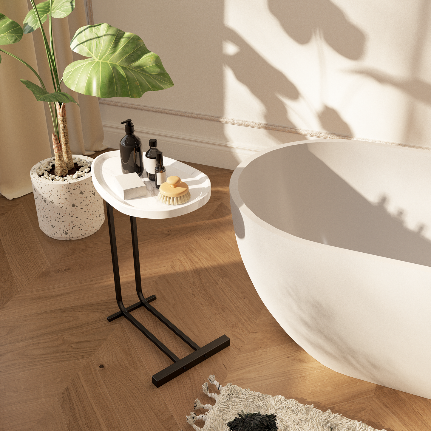 Black soap dispenser with white pump on Cshaped side table