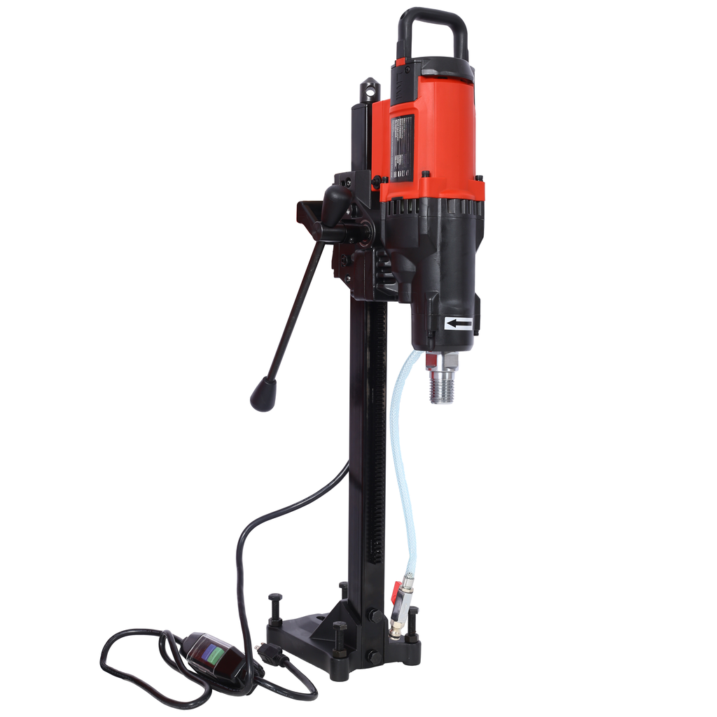 Red and black portable core drill with adjustable stand and water hose for construction