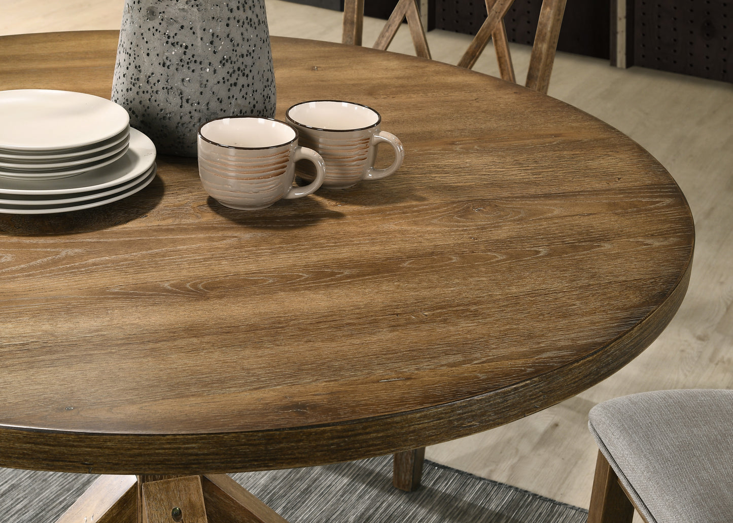 Rustic oak round dining table with distressed finish