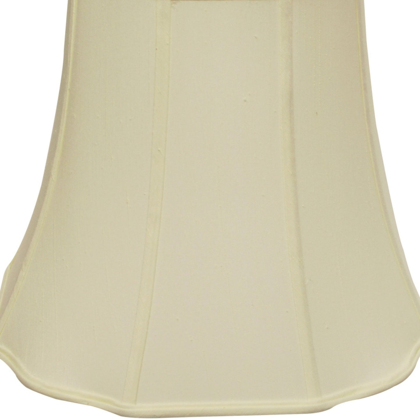 Cream empire lampshade with decorative trim on a white background