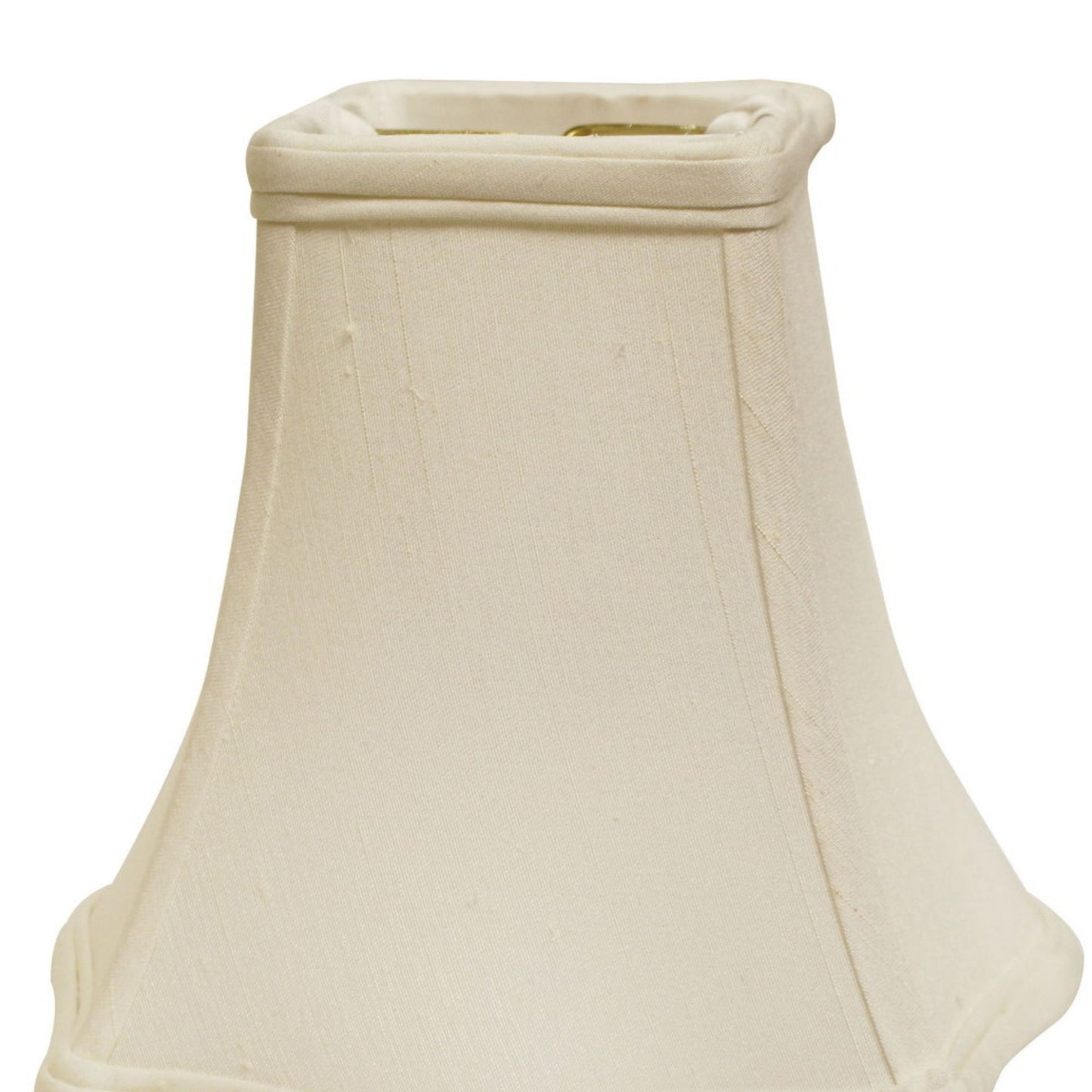Beige fabric lampshade with elegant pleated detail and brass fixture detail