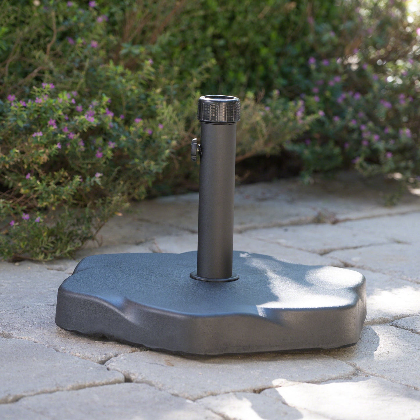 Dark grey patio umbrella base sturdy resin construction designed for outdoor stability