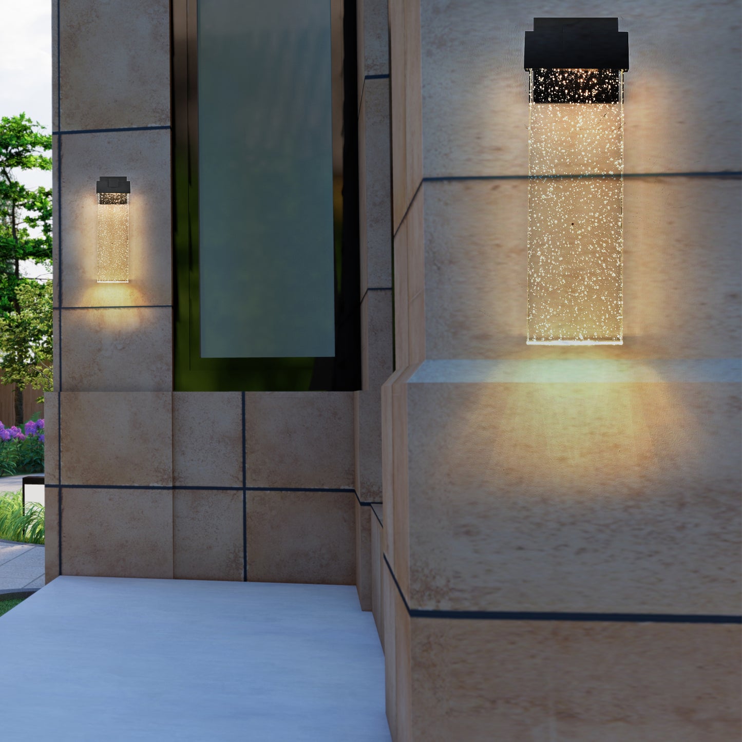 Modern bubble glass wall sconce with black fixture and warm LED light