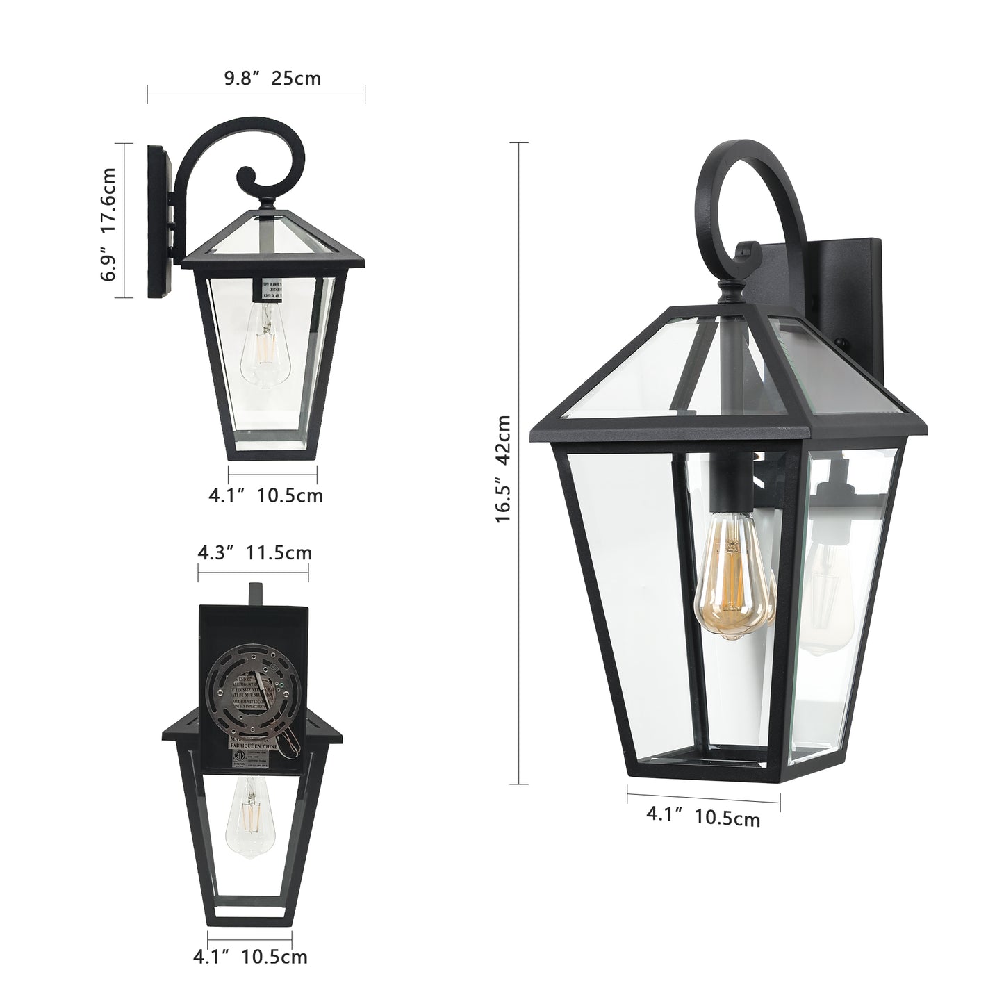 Black hexagonal outdoor wall light with clear glass panels and decorative scroll arm