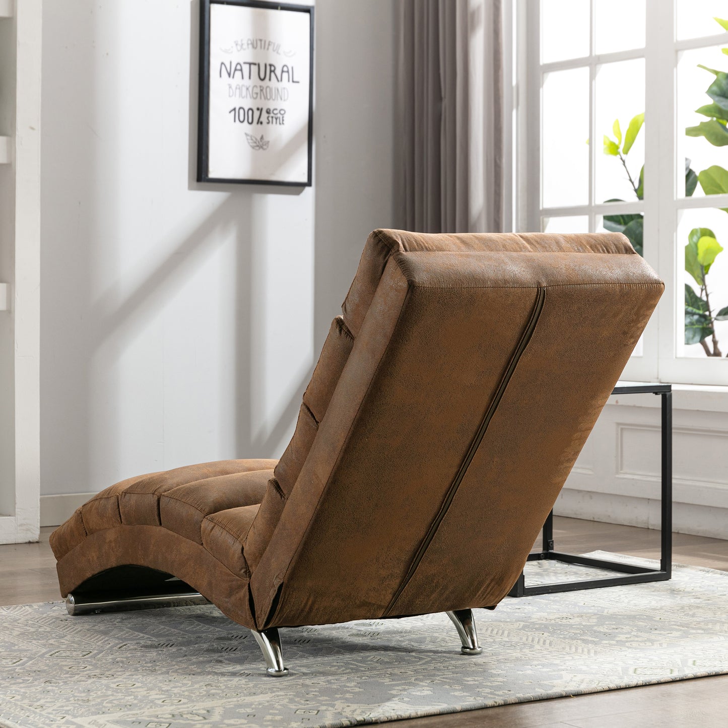 Brown upholstered chaise lounge with modern metal legs perfect for relaxing