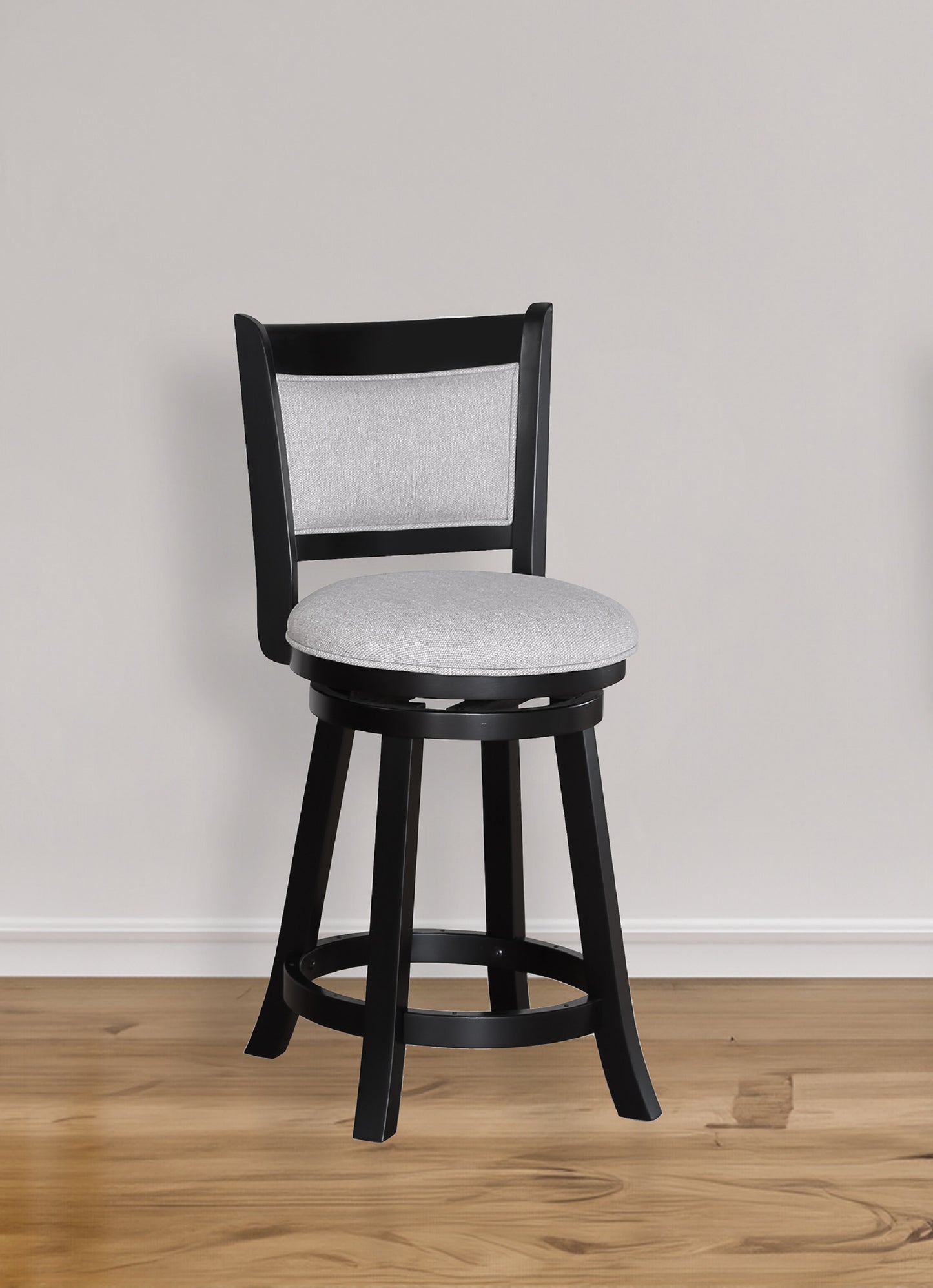 Black swivel bar stool with light gray upholstered seat and backrest