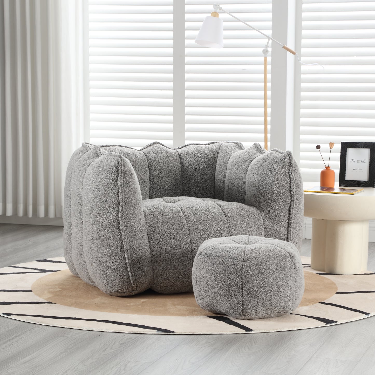 Textured gray boucle armchair and ottoman set for living room