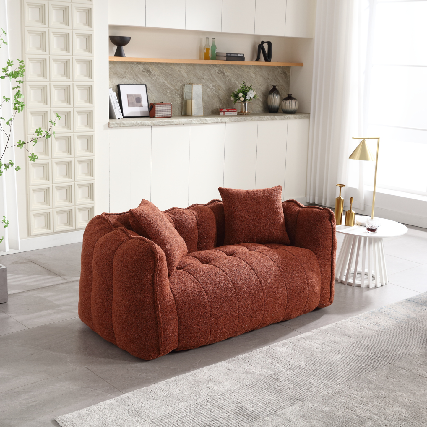 Terracotta boucle fabric sofa with plush cushions and tufted seat