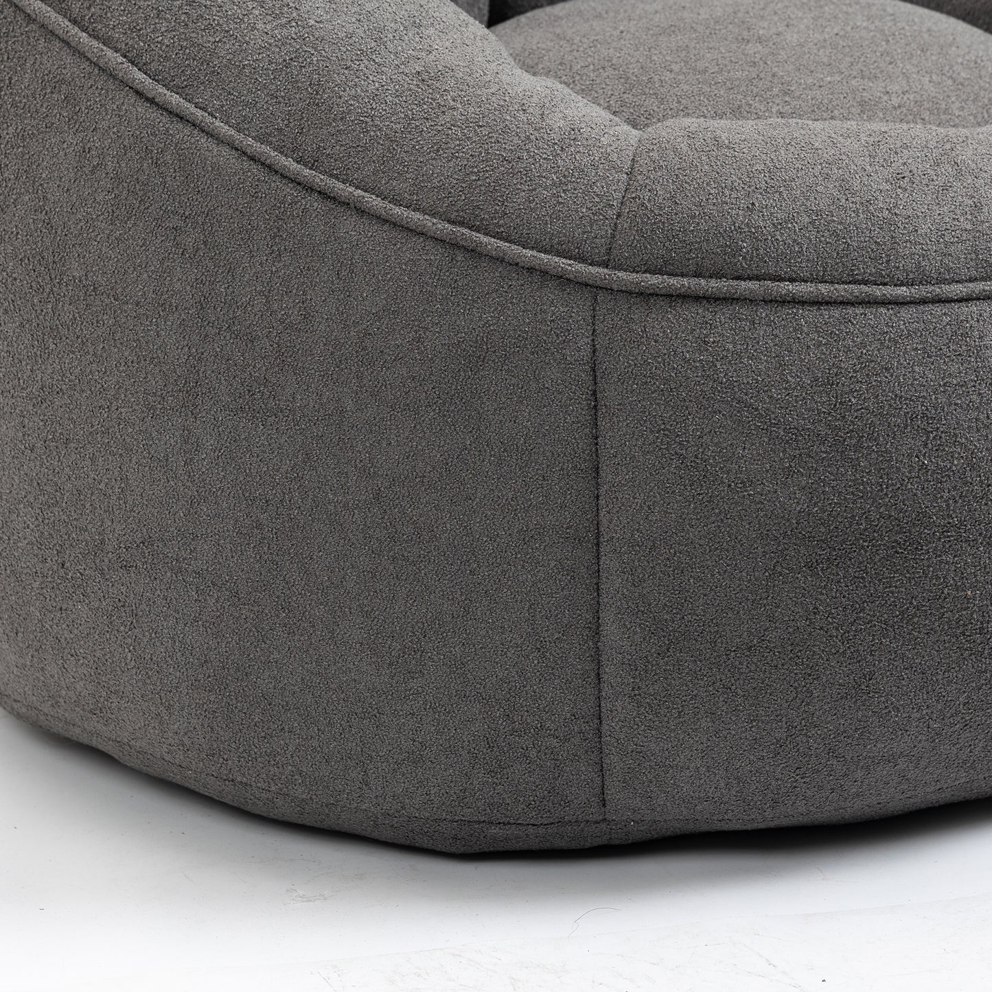 Dark grey textured bean bag chair with subtle stitching detail