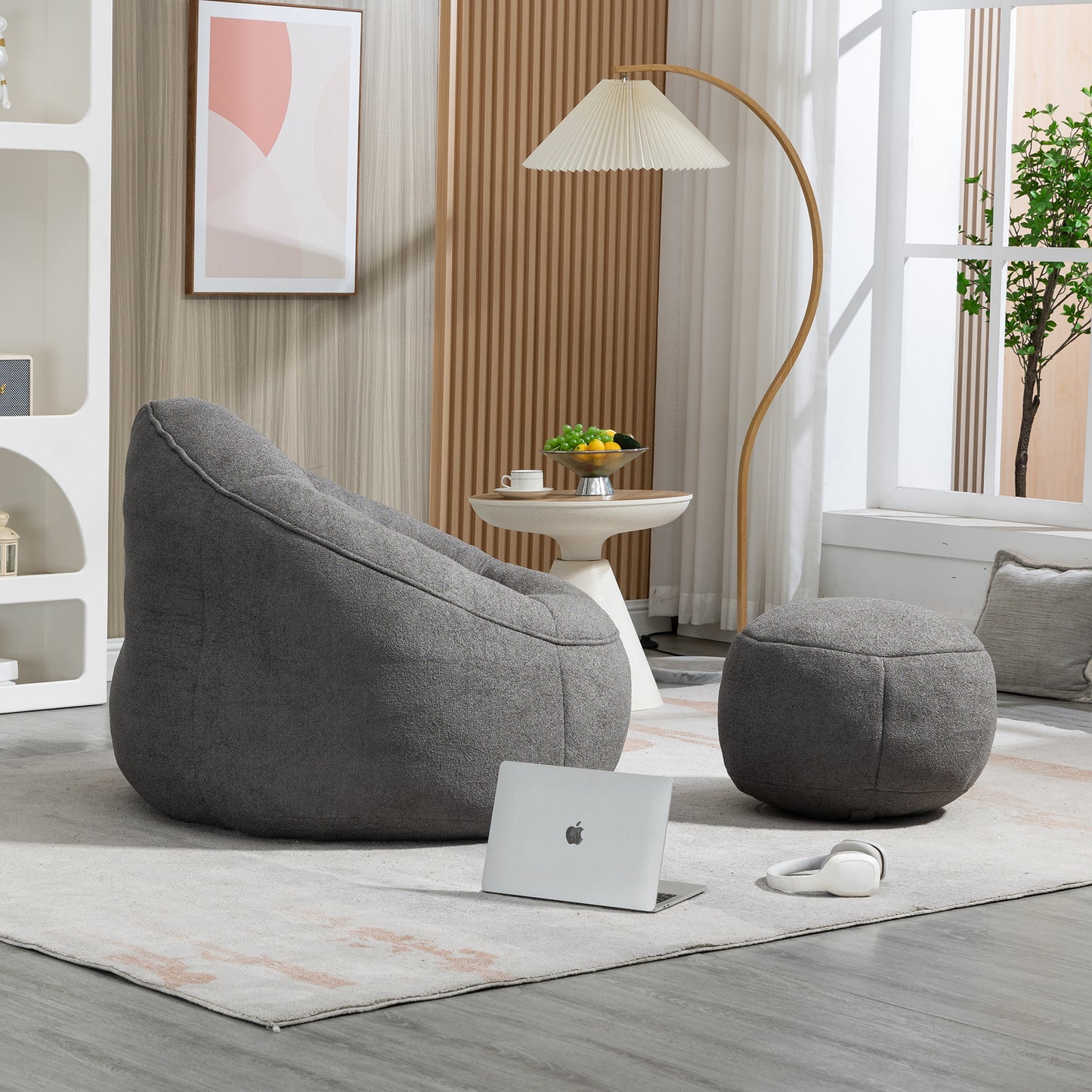 Comfortable grey boucle fabric bean bag chair with matching ottoman for relaxing