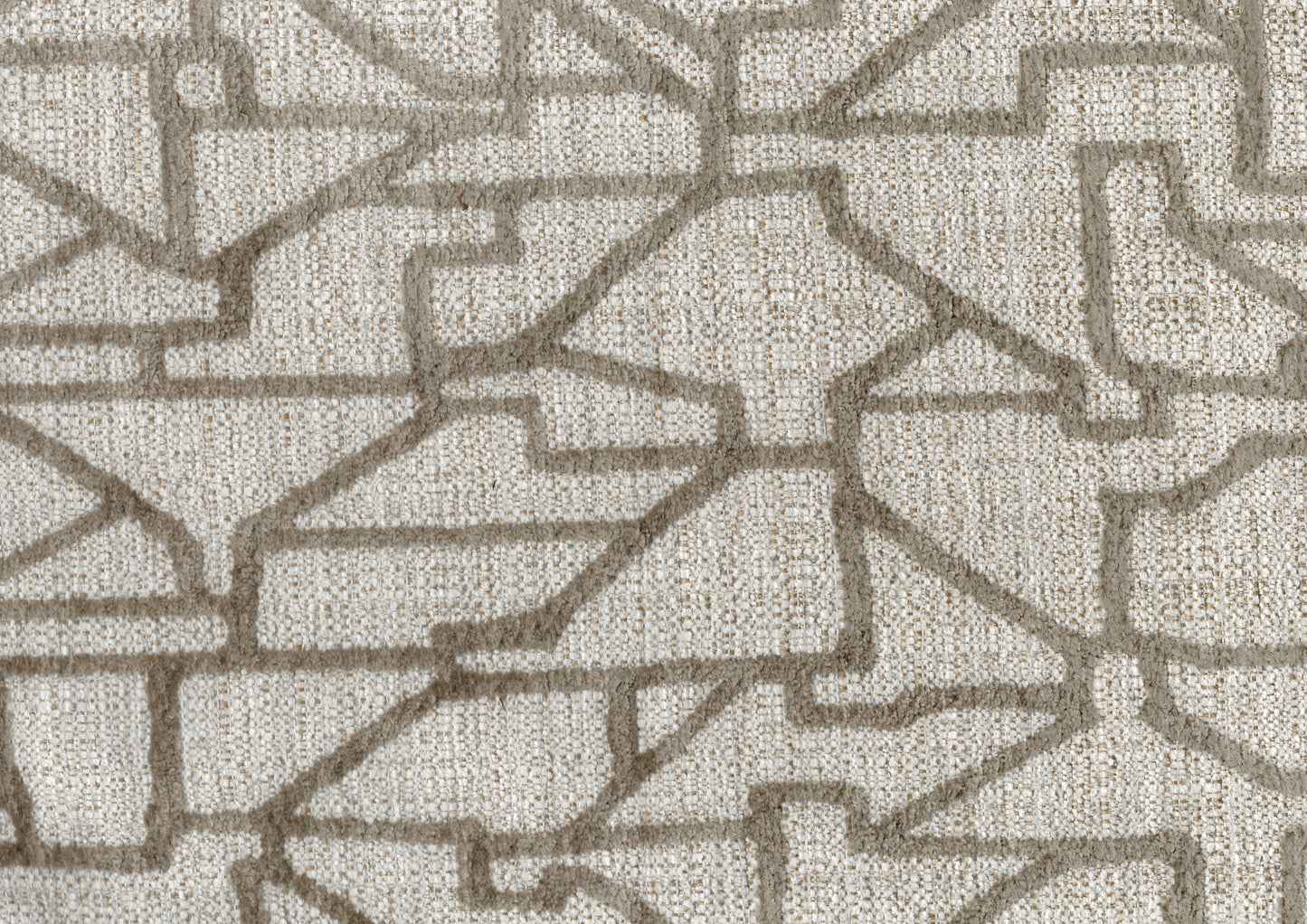Closeup of textured beige fabric with an abstract geometric pattern in taupe chenille