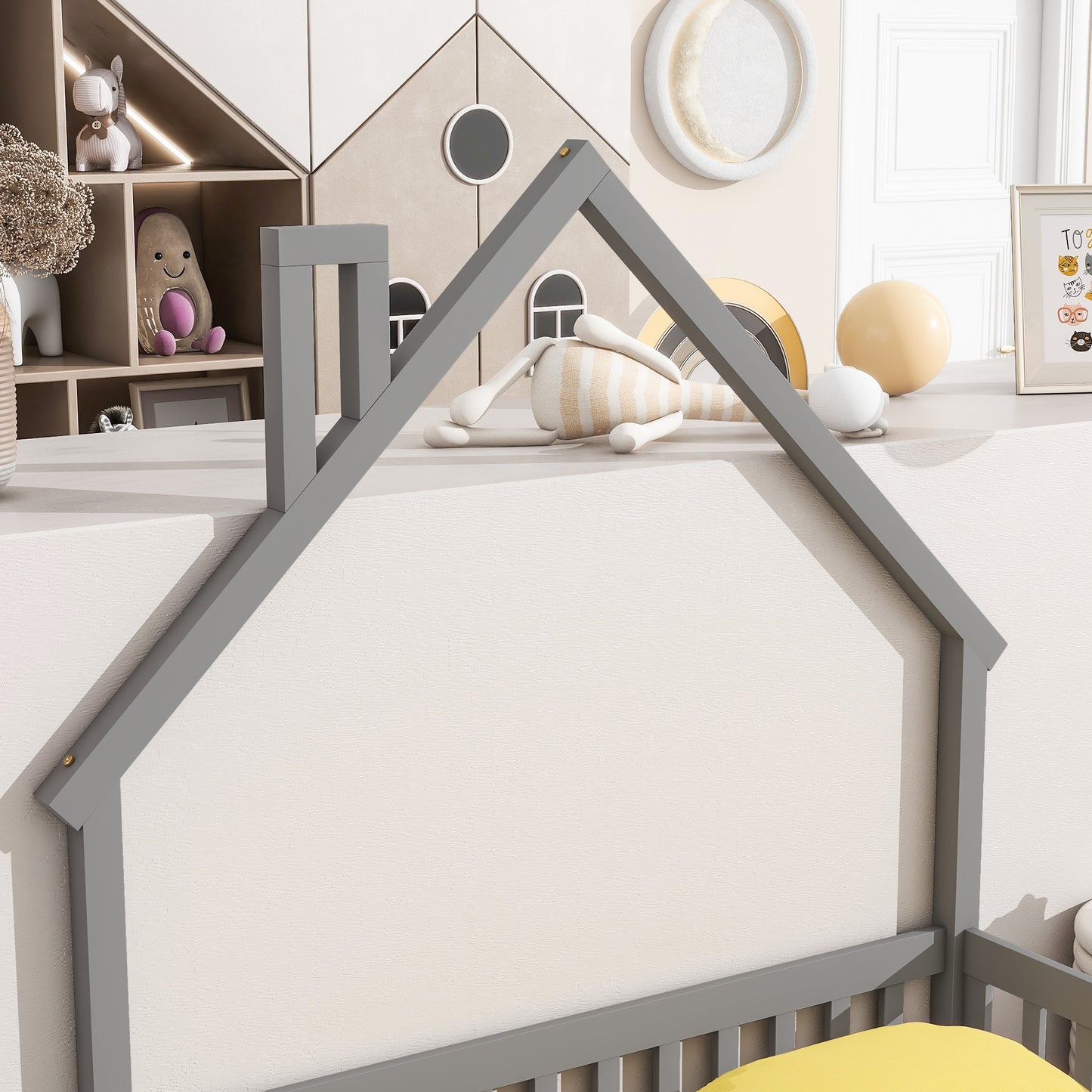 Grey wooden house bed frame with plush toys
