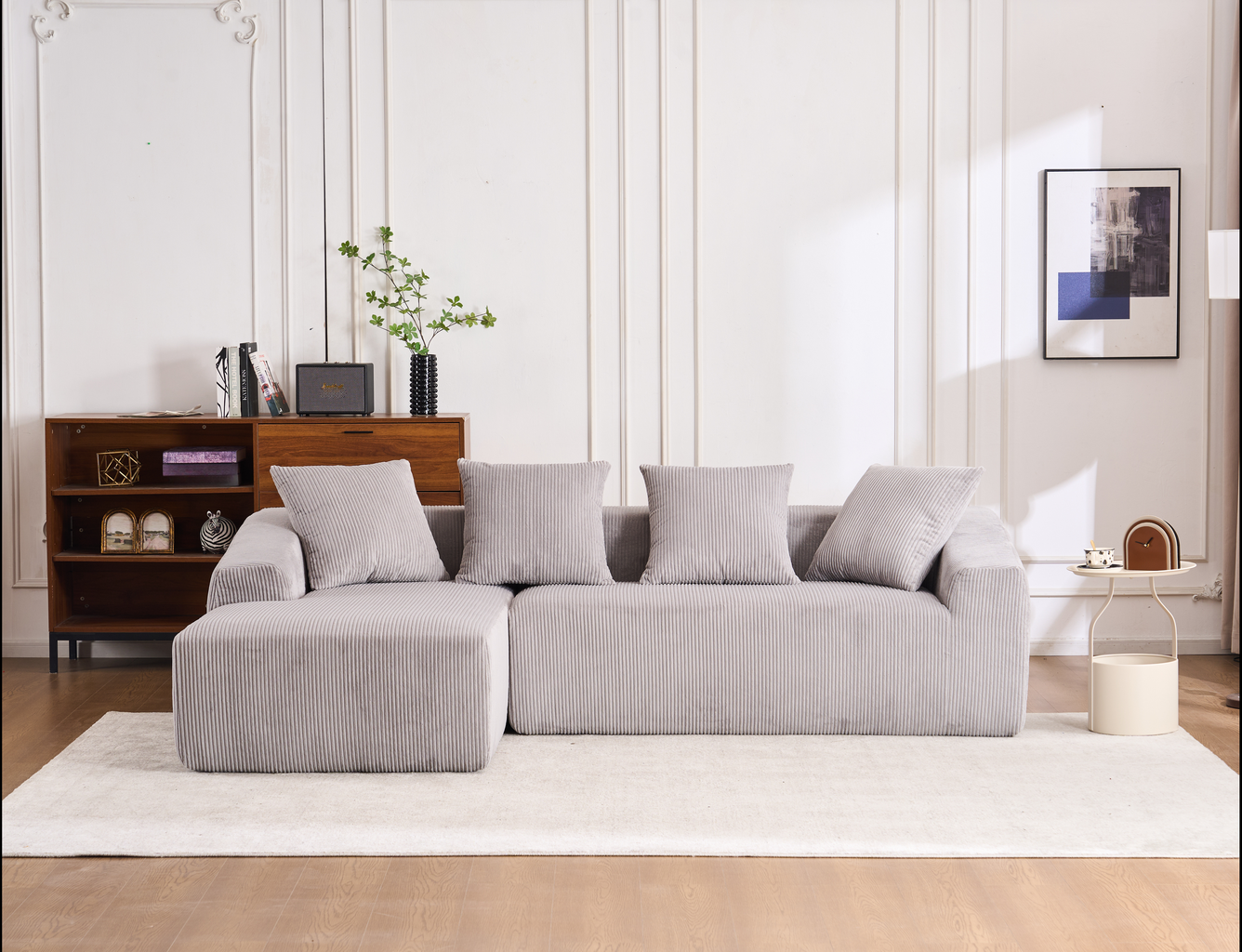 Plush corduroy sectional sofa in a light grey offering comfortable seating for modern living rooms