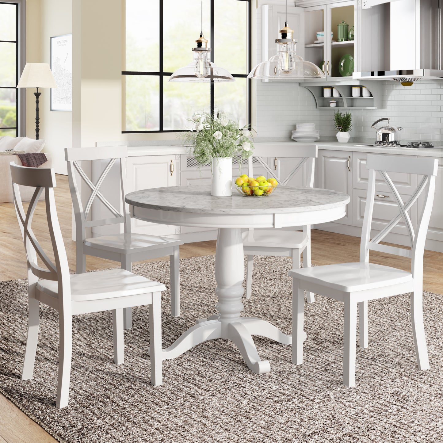 White pedestal base dining table with marble top and four crossback chairs