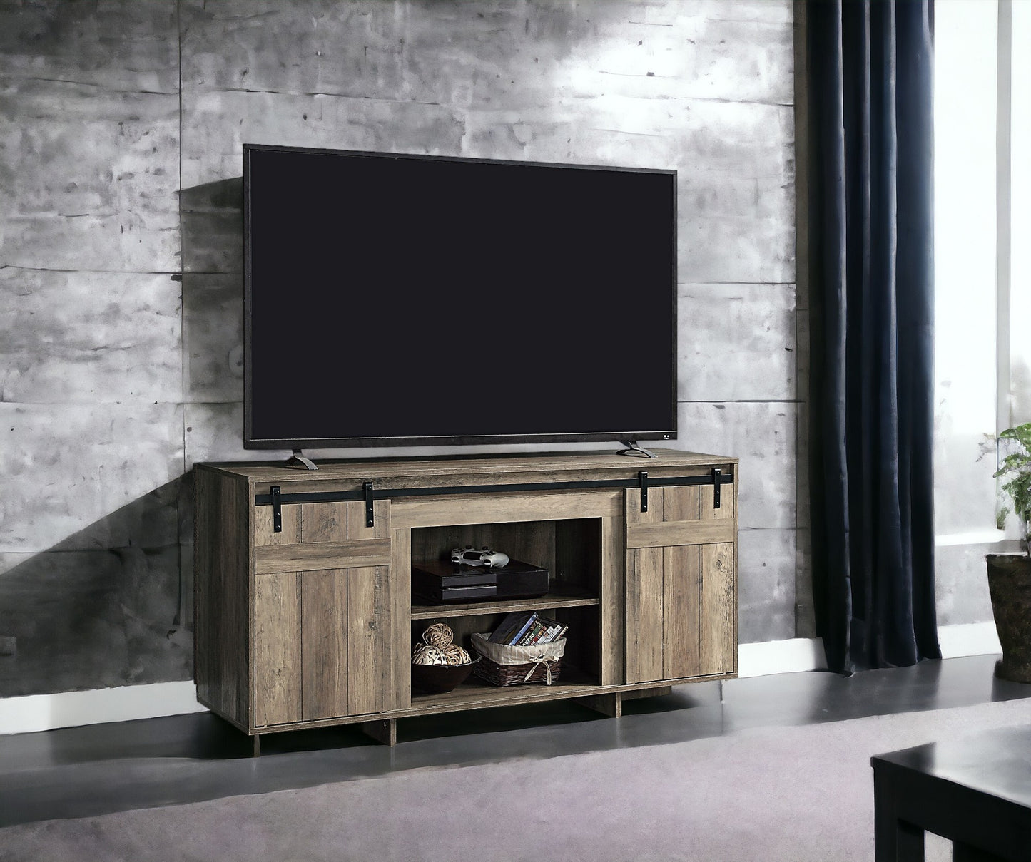 Rustic oak farmhouse TV stand with sliding barn doors and open shelving for media storage