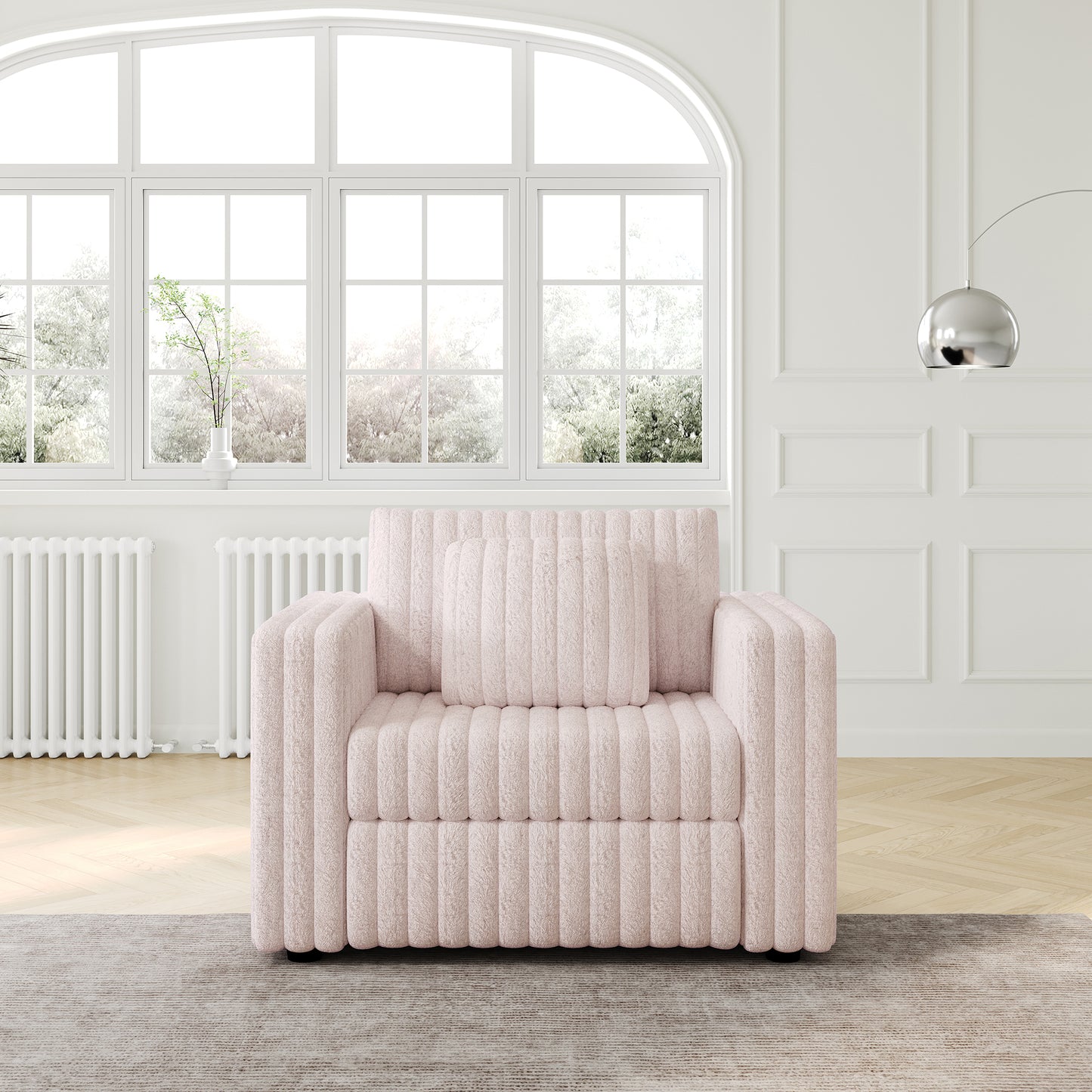 Textured pink boucle armchair with plush cushioning and matching throw pillow