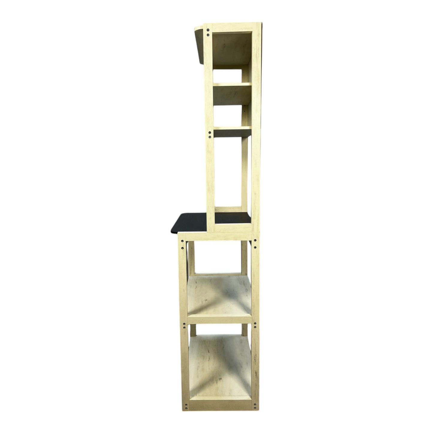 Light wood corner shelf unit with black shelves and desk space