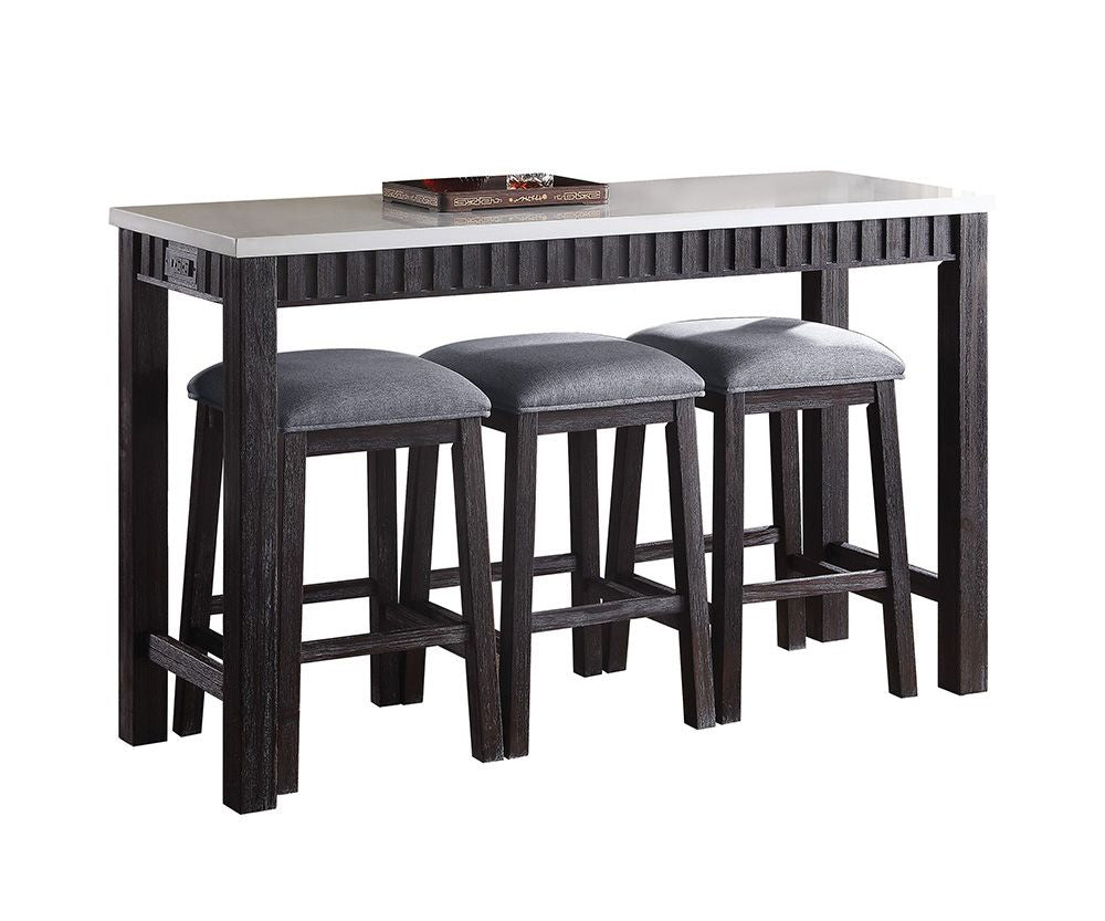 Dark wood counter height table with three gray upholstered stools perfect for small spaces