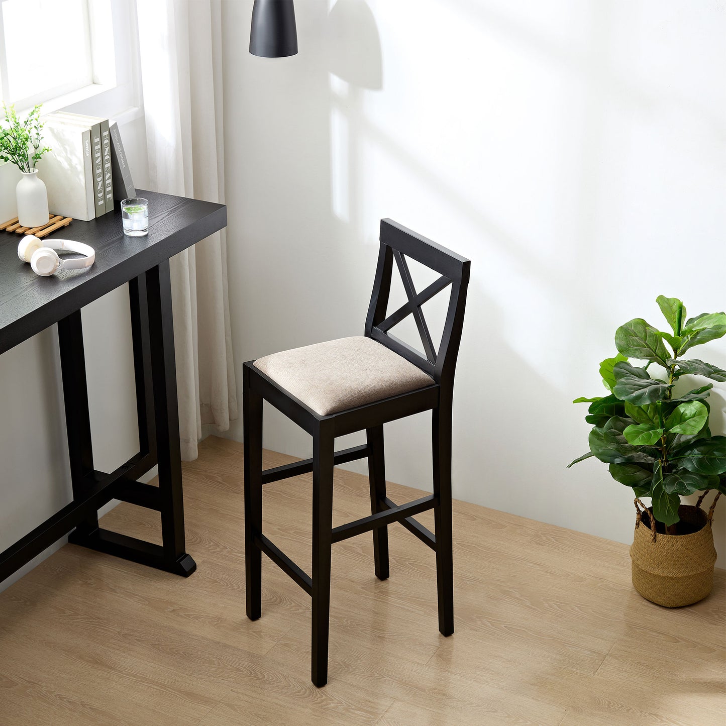 Black wooden bar stool with Xback design and beige upholstered seat