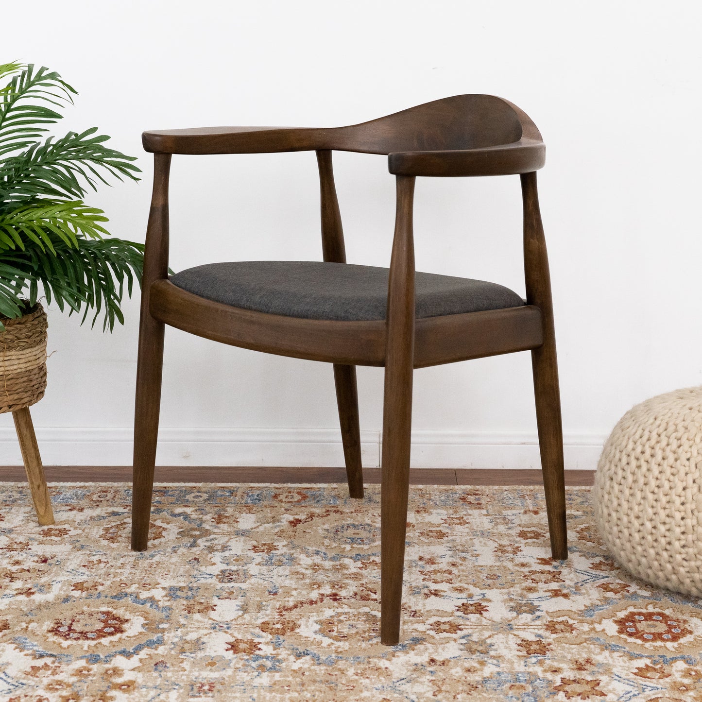 Midcentury modern wood armchair with grey upholstered seat for dining