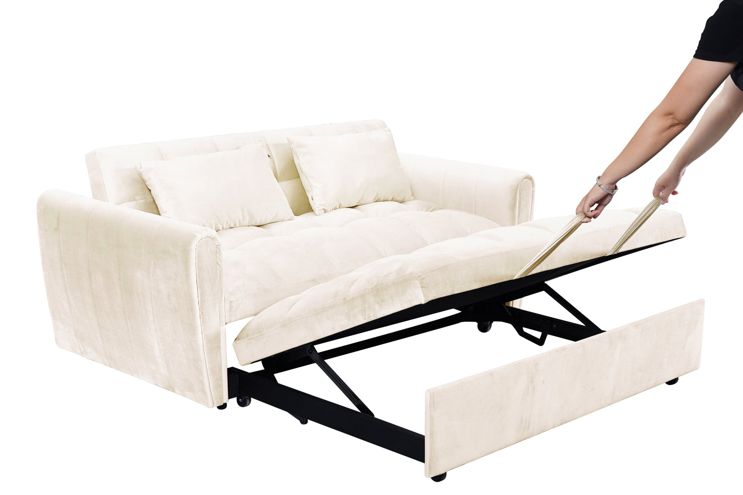 Cream velvet sofa bed with pullout mattress mechanism being operated