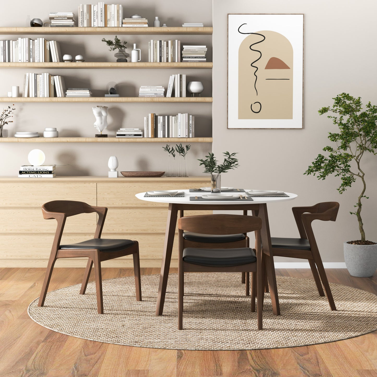 Wooden dining chairs with black upholstered seats around a white round table