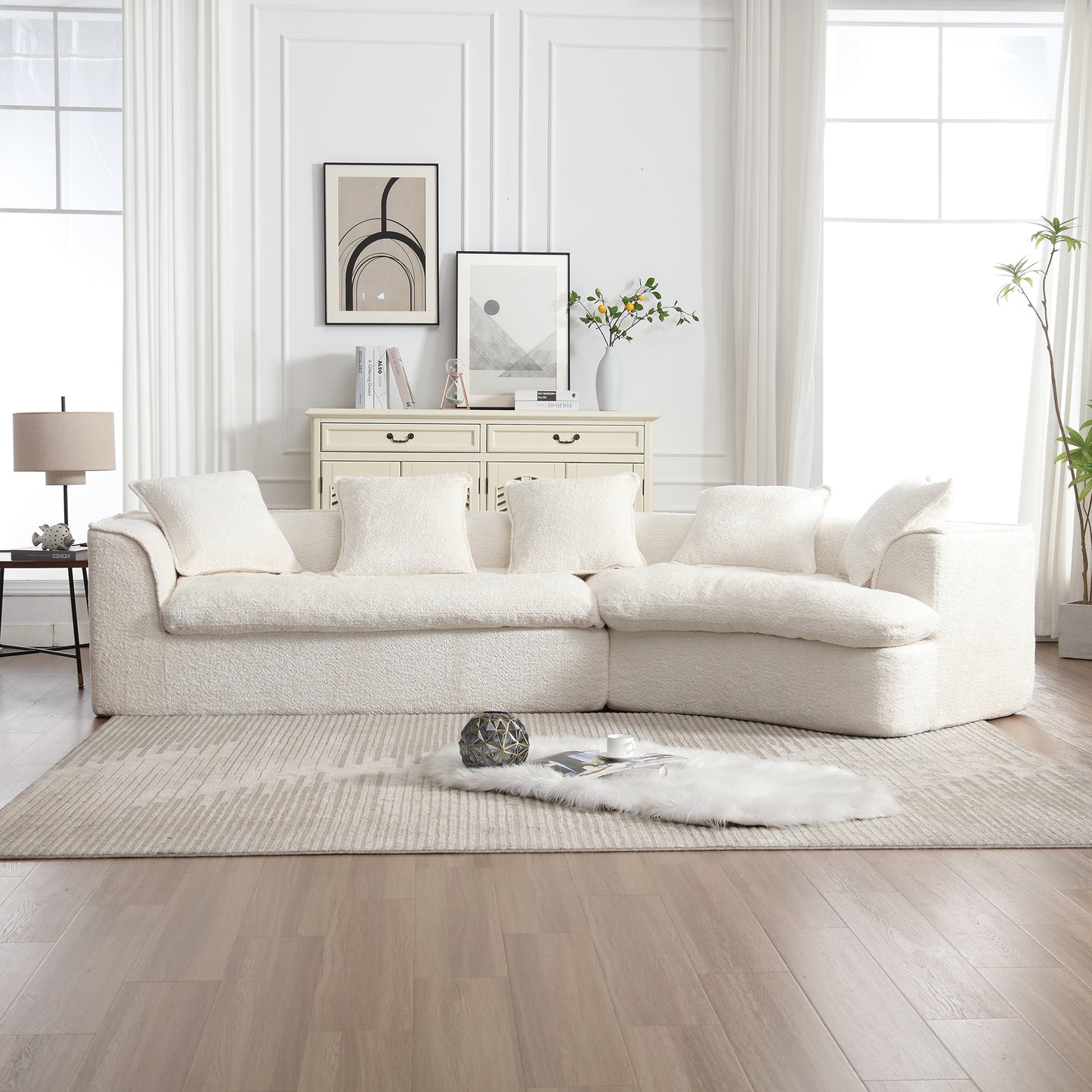 Plush cream modular sofa with oversized cushions and textured fabric for a cozy living room
