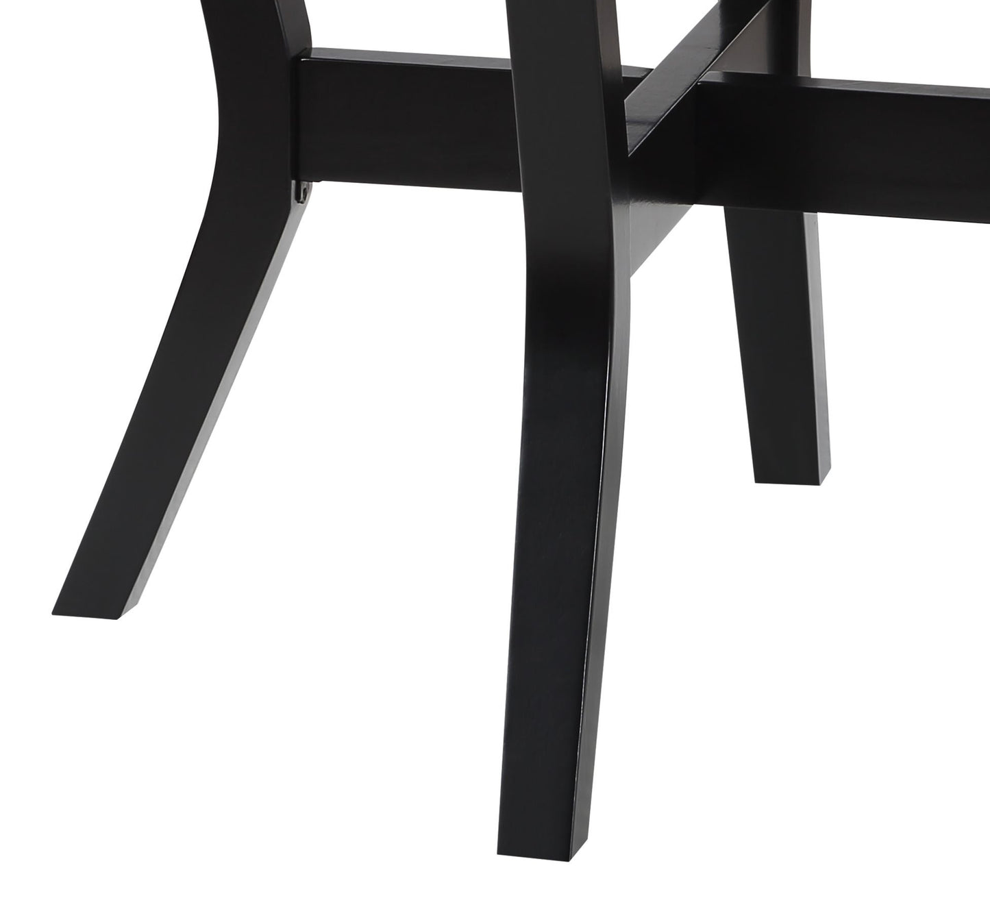 Closeup of black wooden dining chair legs with angled feet