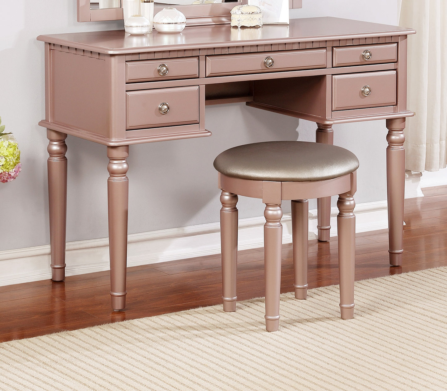 Rose gold vanity with stool