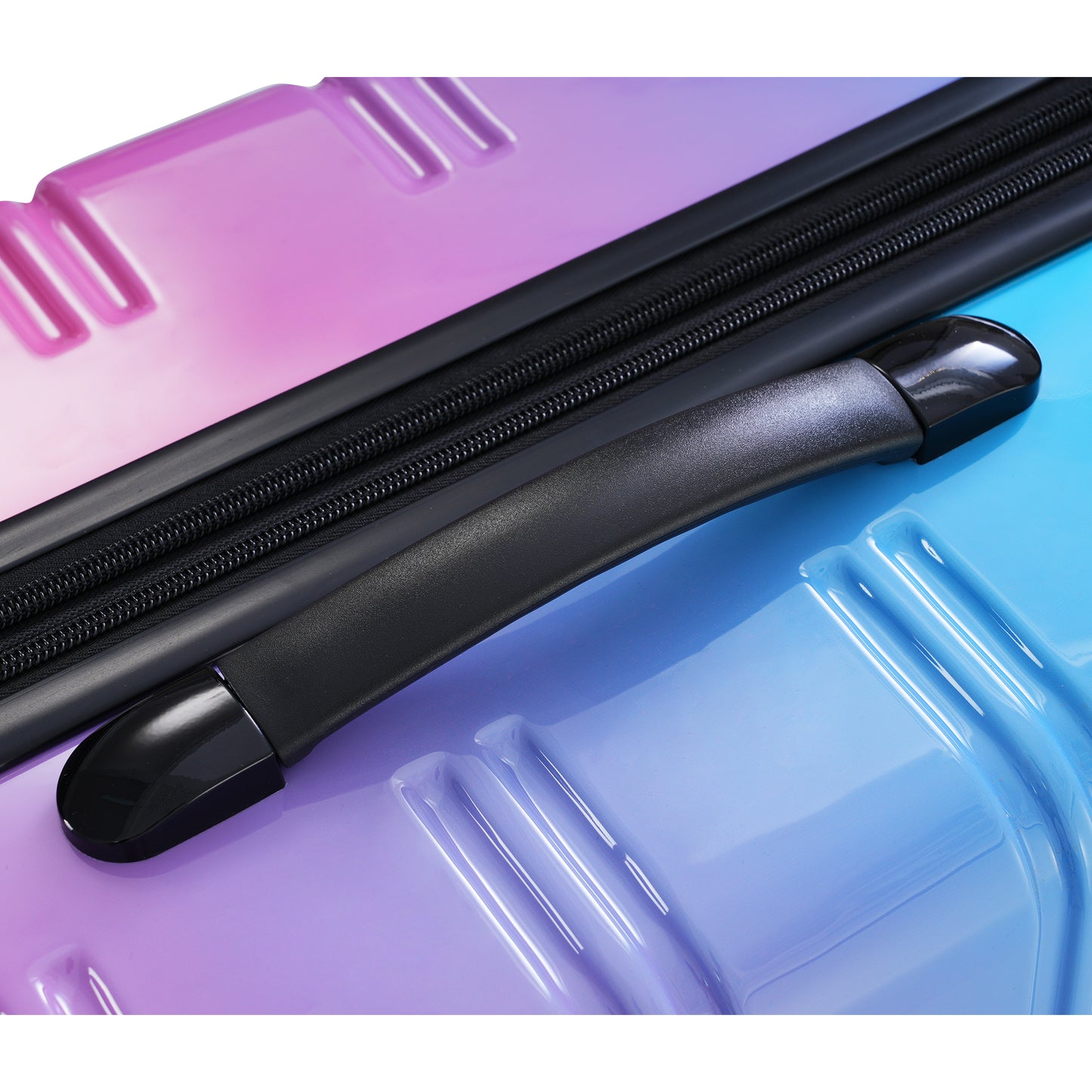Gradient pink and blue polycarbonate hardside suitcase with black handle and zipper detail