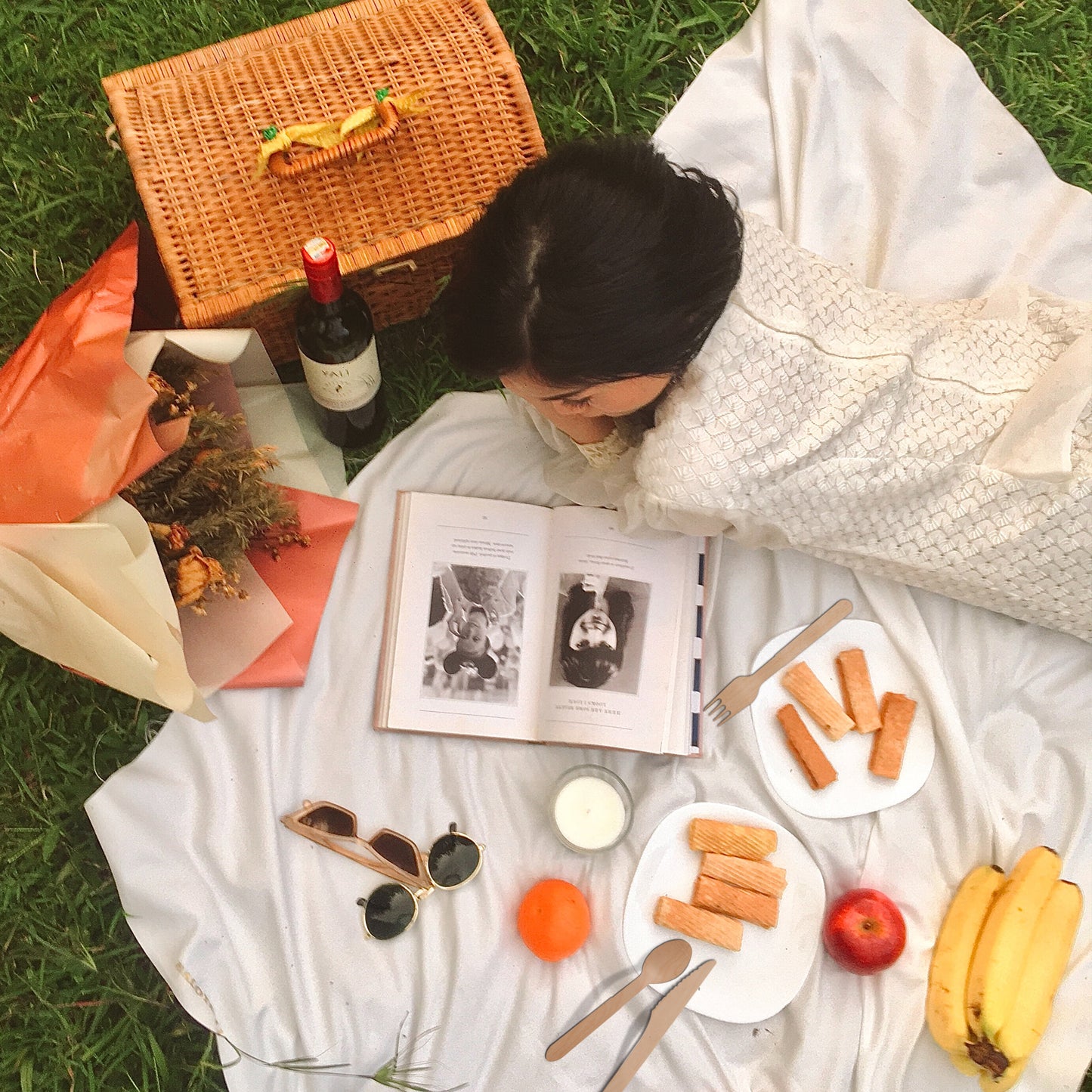 Classic wicker picnic basket with yellow ribbon accents
