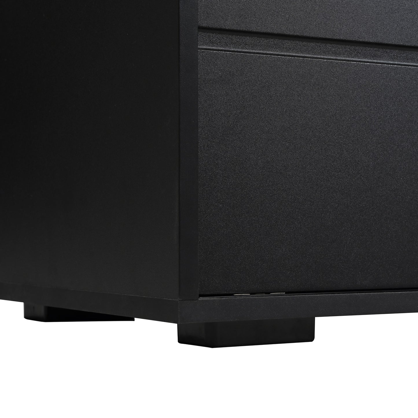 Textured black metal cabinet base with subtle horizontal grooving