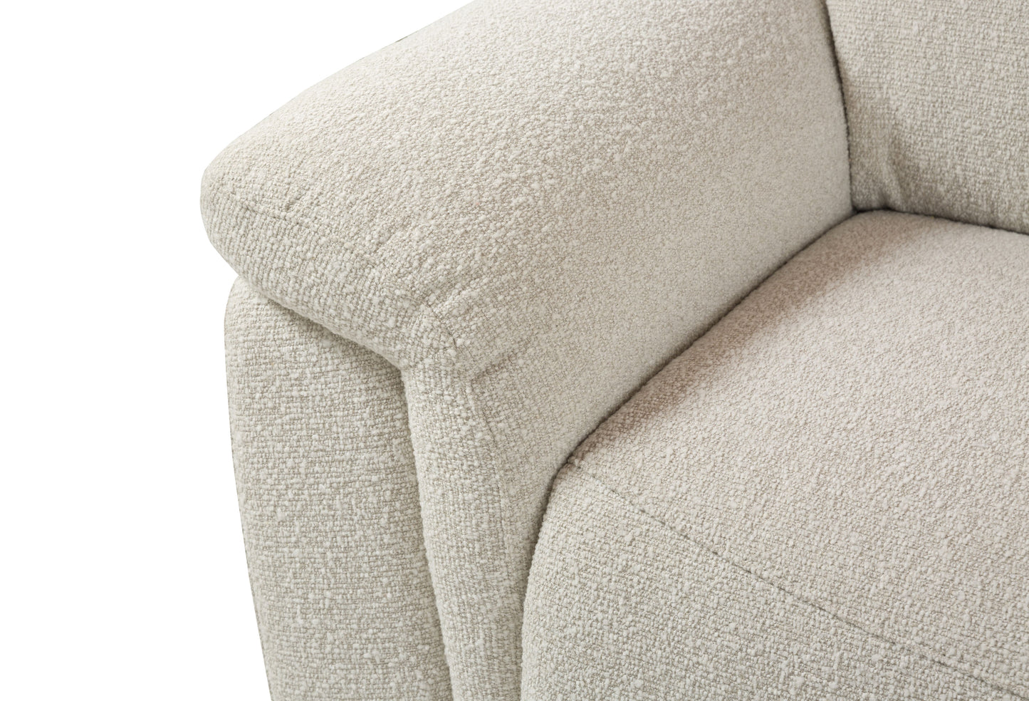Closeup of textured cream boucl fabric on a modern sofa armrest