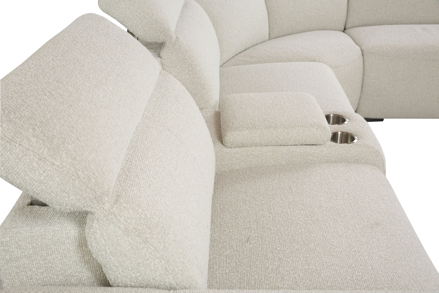 Closeup of a beige textured fabric sectional sofa with integrated cup holders