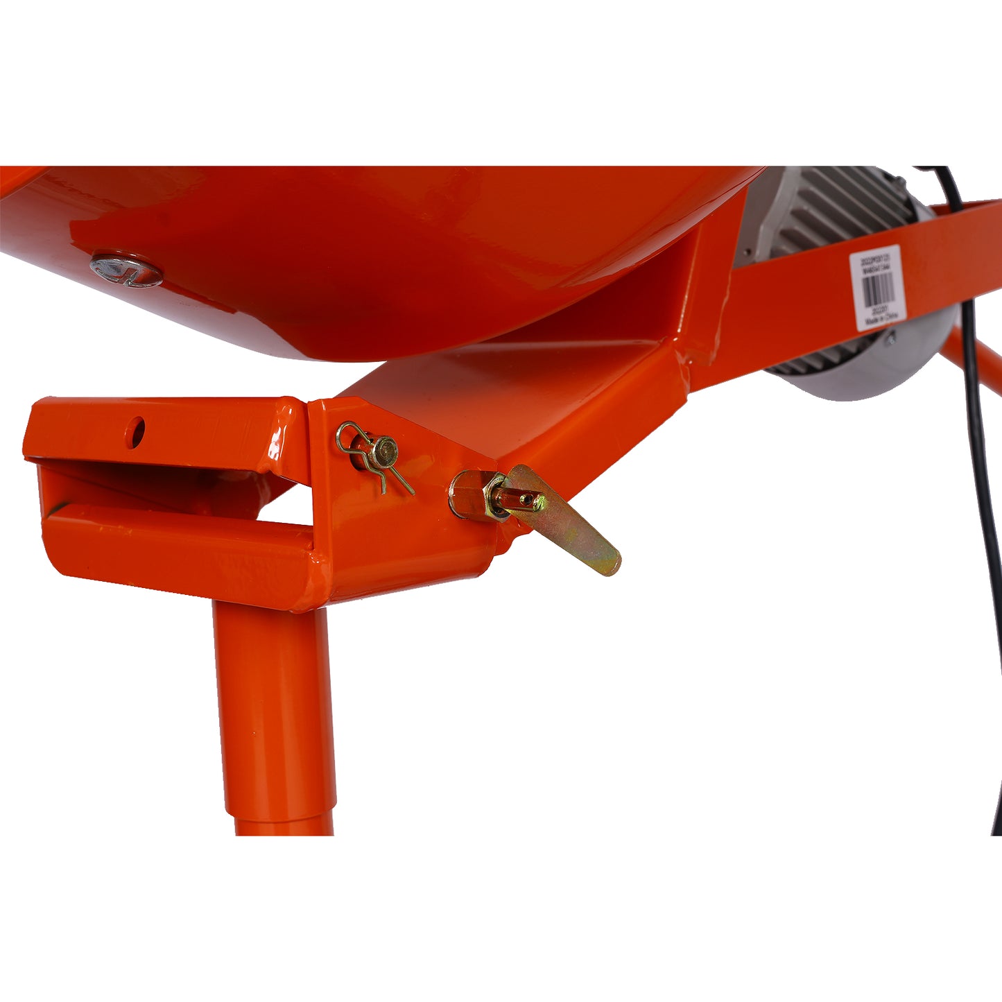 Closeup of orange cement mixer hopper with latch pin and spring clip