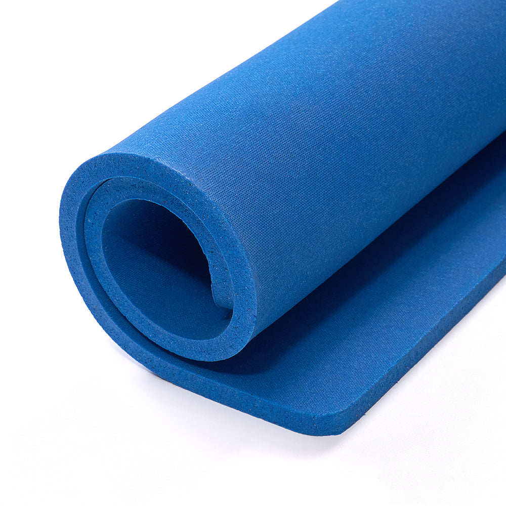 Rolled blue yoga mat with textured surface for grip and comfort during exercise
