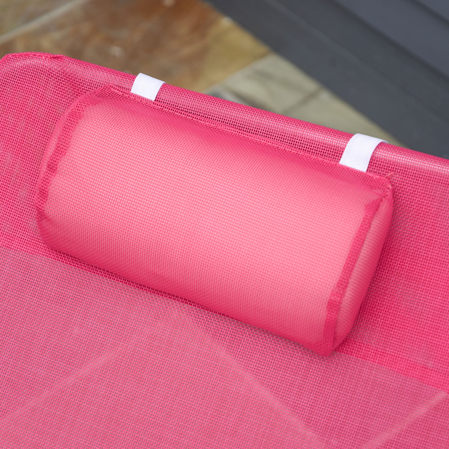 Pink mesh recliner pillow with white strap