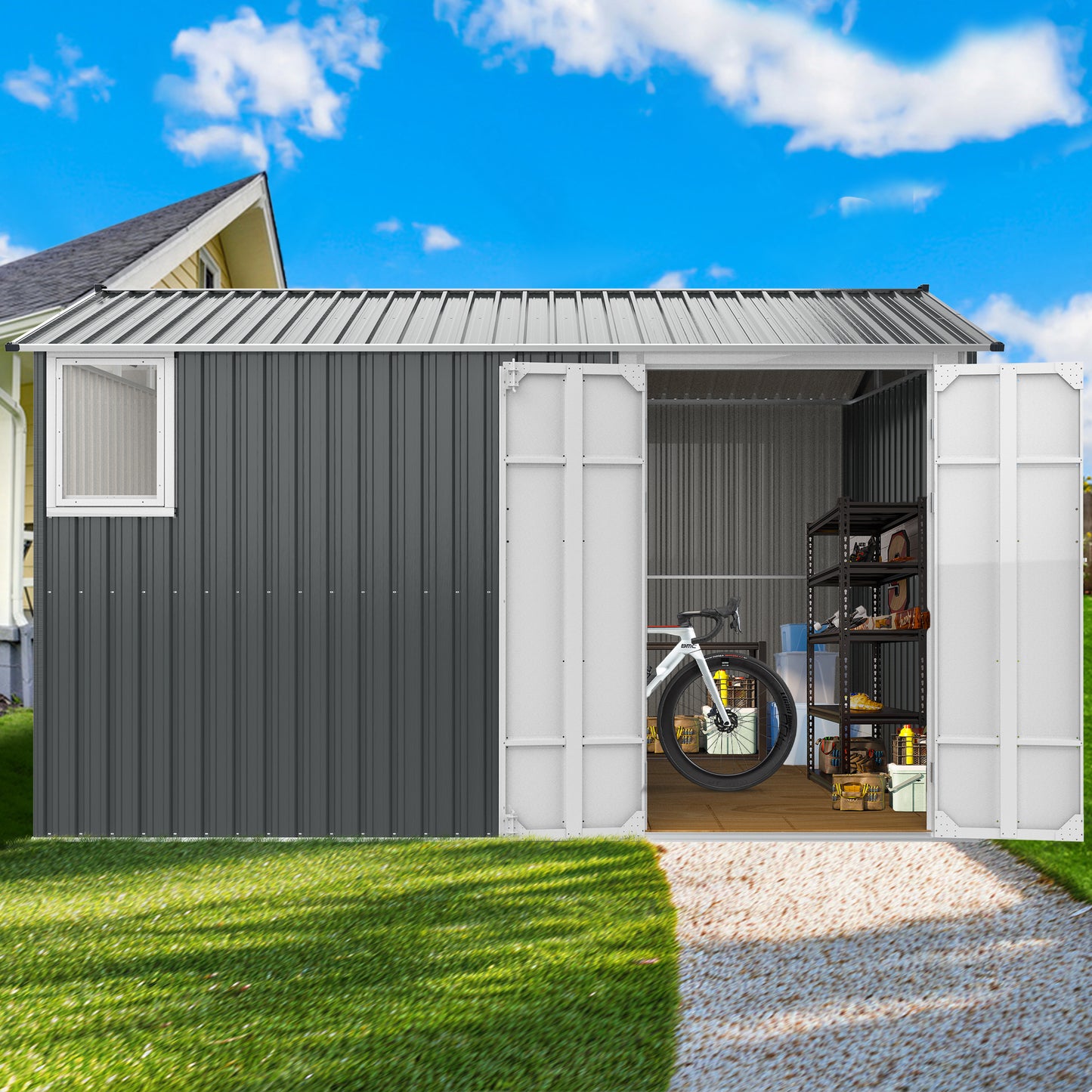 Grey metal outdoor storage shed with sliding door and window holding bicycle and shelves