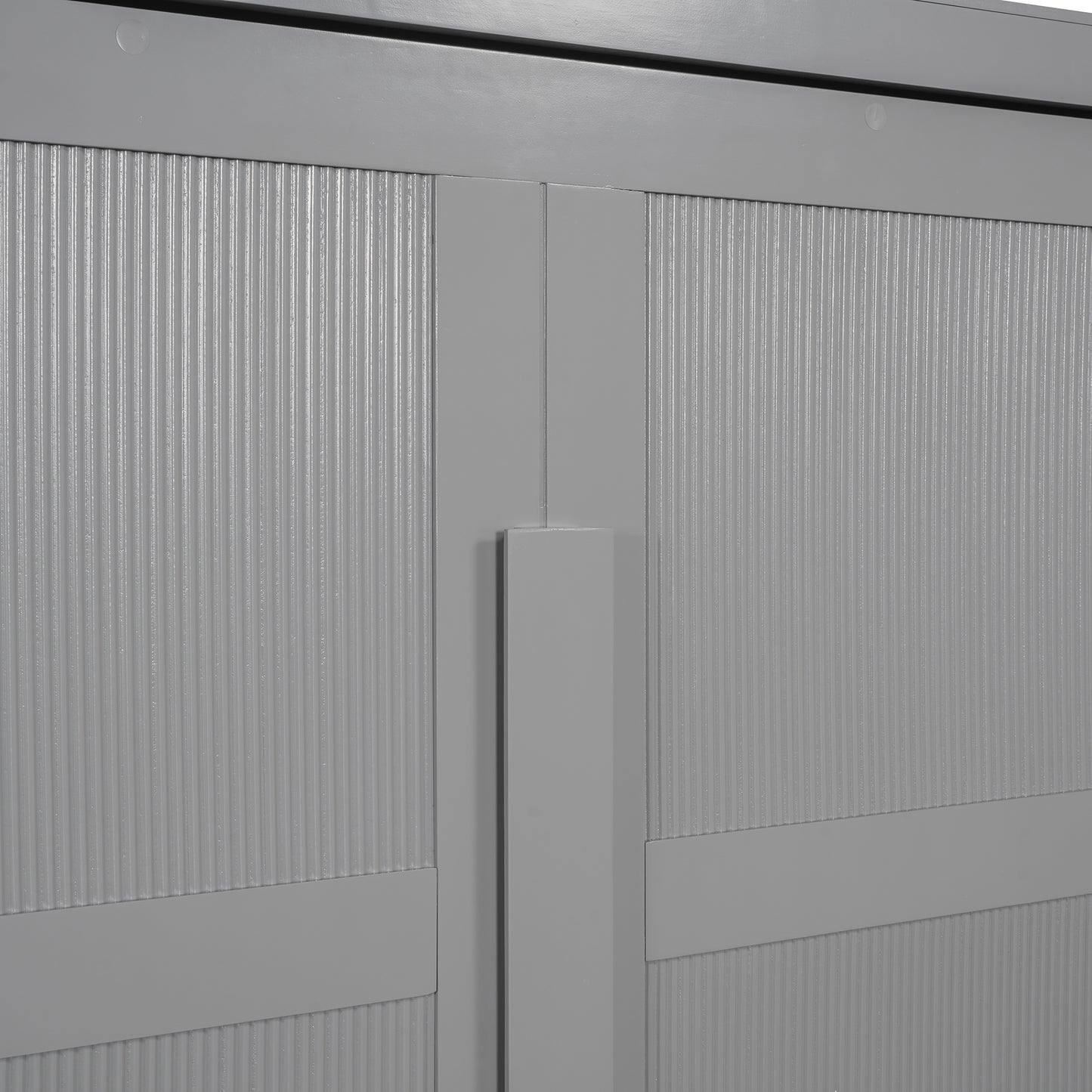 Closeup of gray cabinet doors with vertical ribbed texture and matte finish