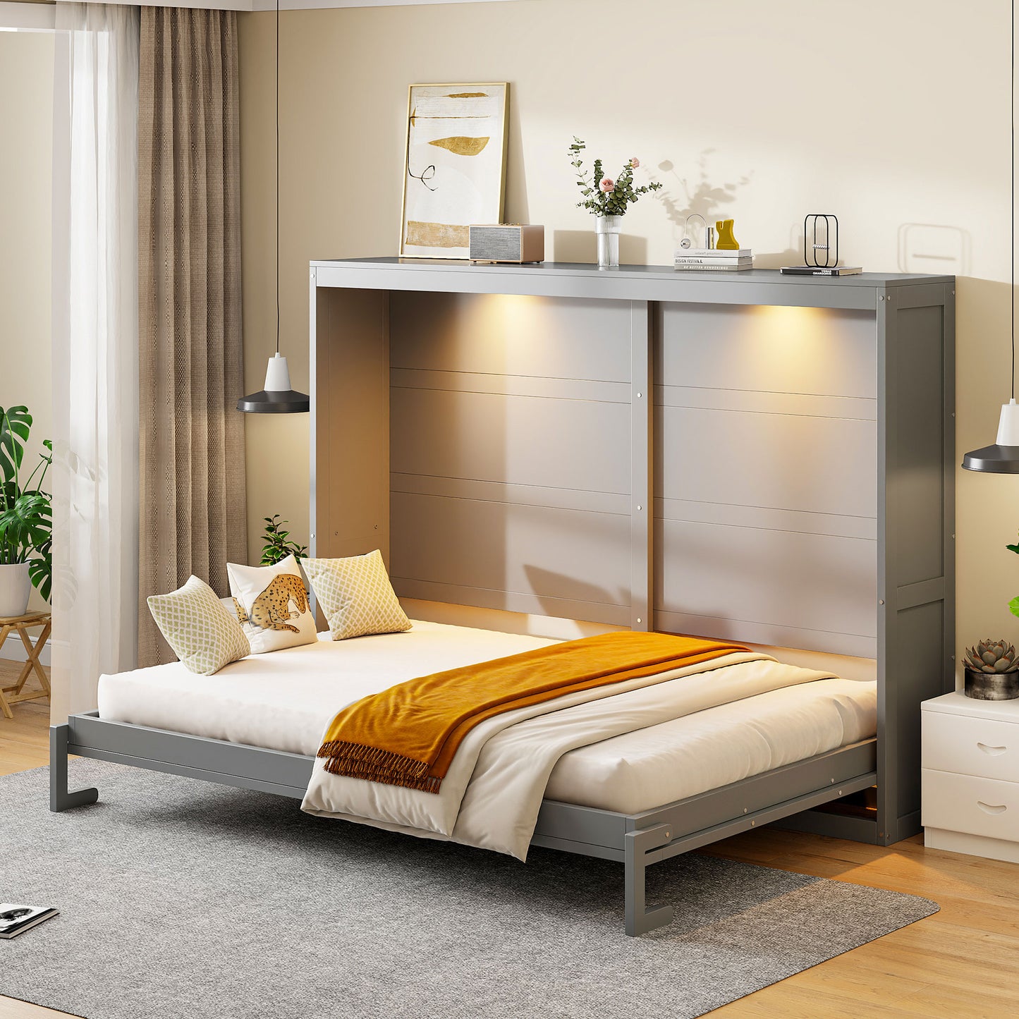 Gray murphy bed with open mattress orange throw and decorative pillows