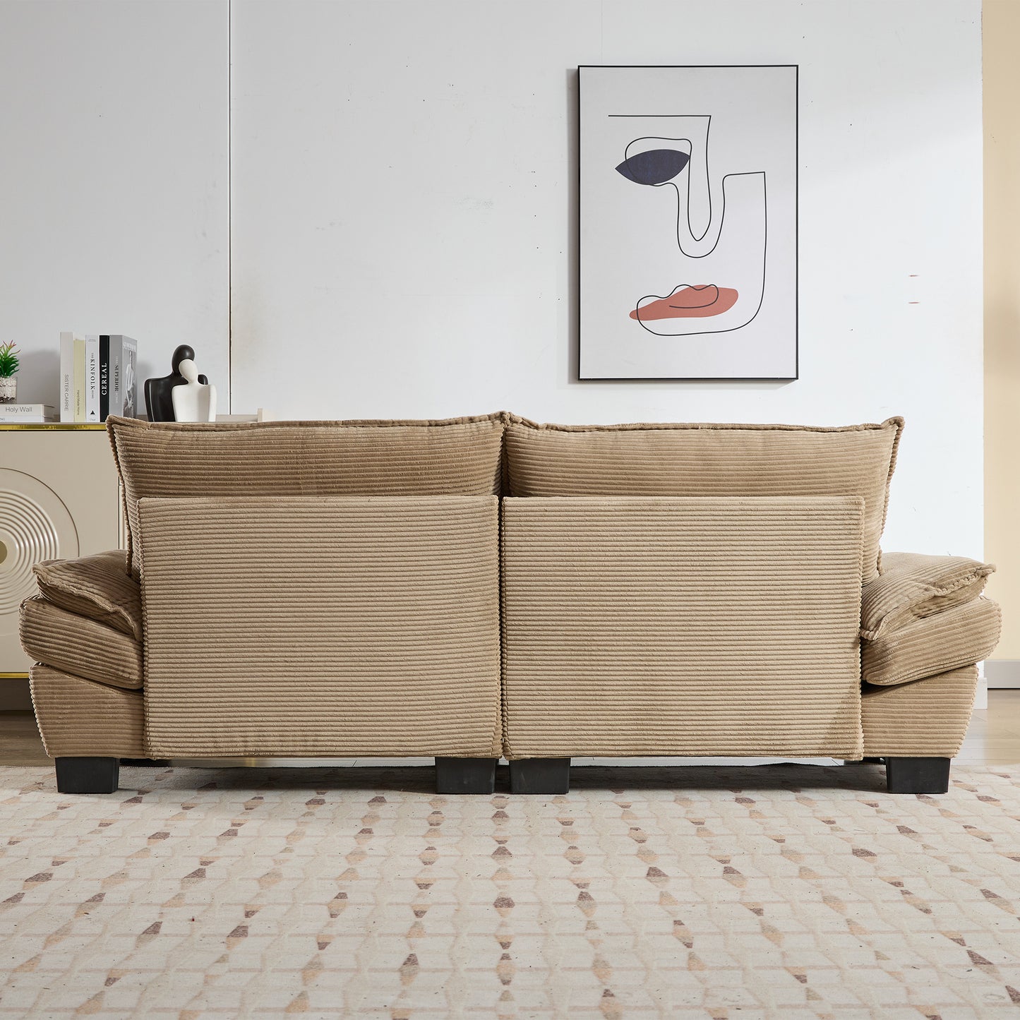 Beige corduroy sofa with plush cushions perfect for a cozy living room