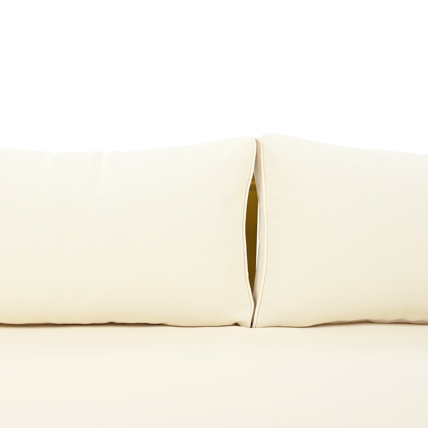 Closeup of a creamcolored tufted outdoor cushion showing stitched detail for comfort