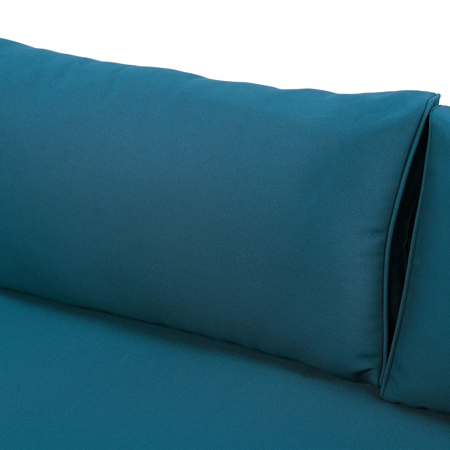 Closeup of a teal outdoor cushion showing textured fabric and stitching details