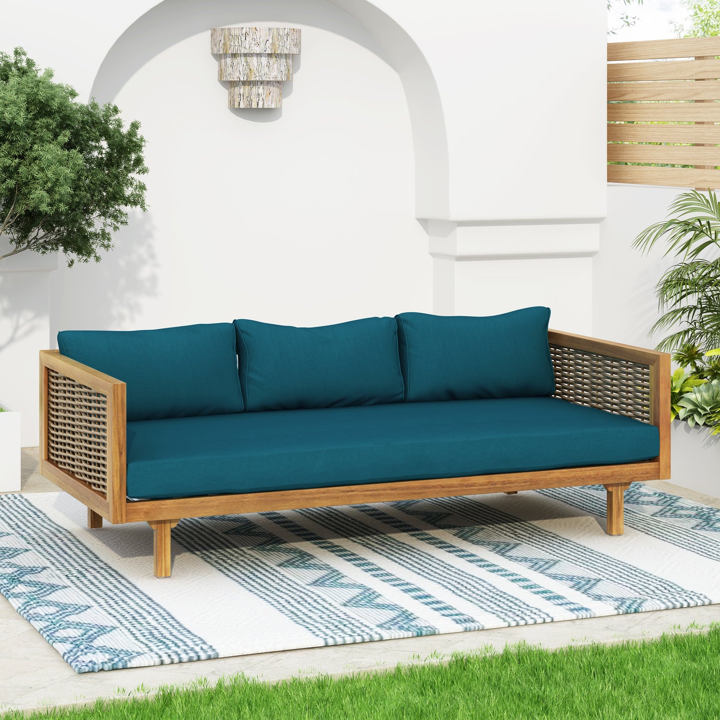 Teal outdoor loveseat with natural wood frame and woven sides