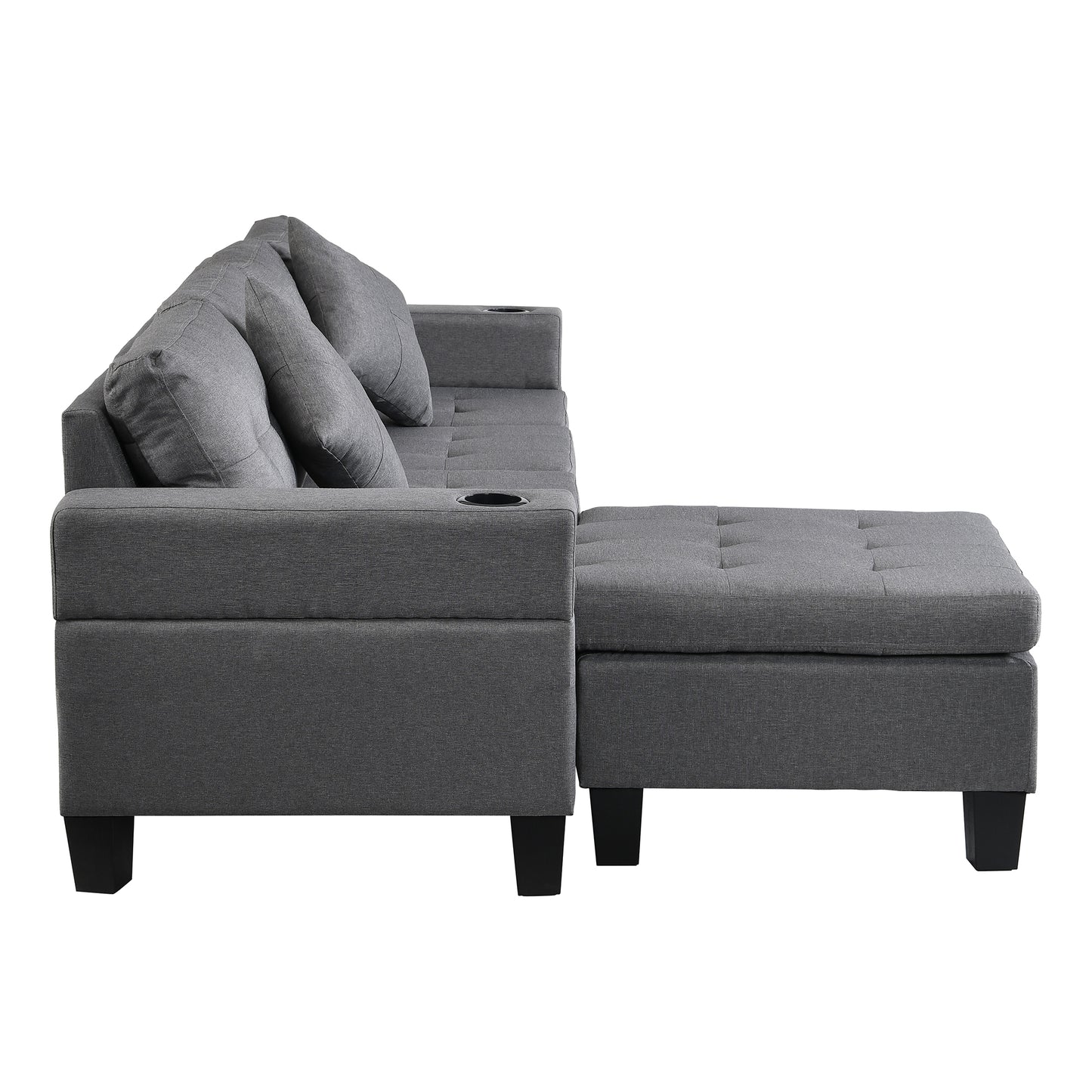Dark grey upholstered sectional sofa with matching ottoman and builtin cup holders
