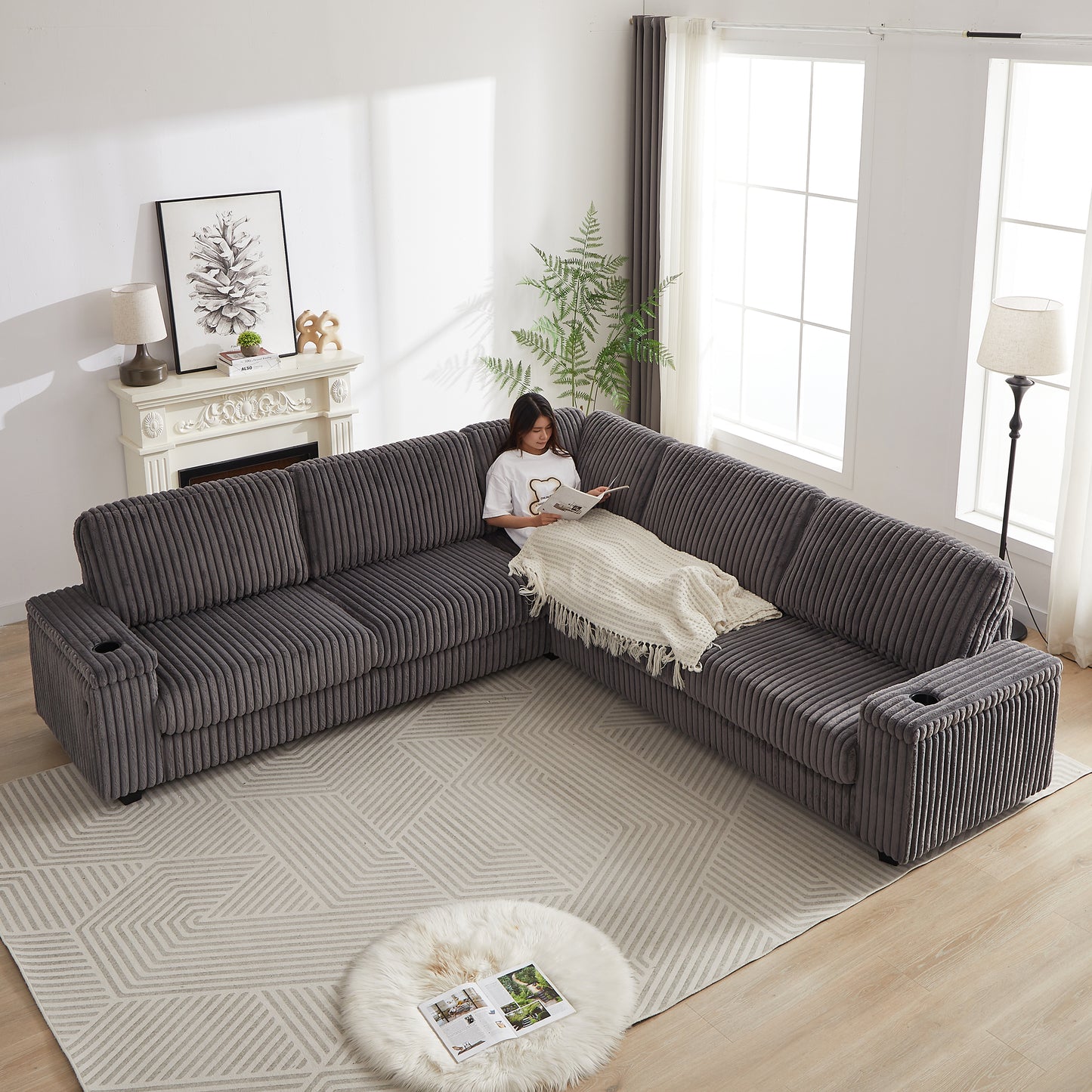 Plush corduroy sectional sofa in charcoal gray with integrated cup holders for ultimate comfort